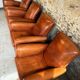 Lot de 4 fauteuils club, Cognac