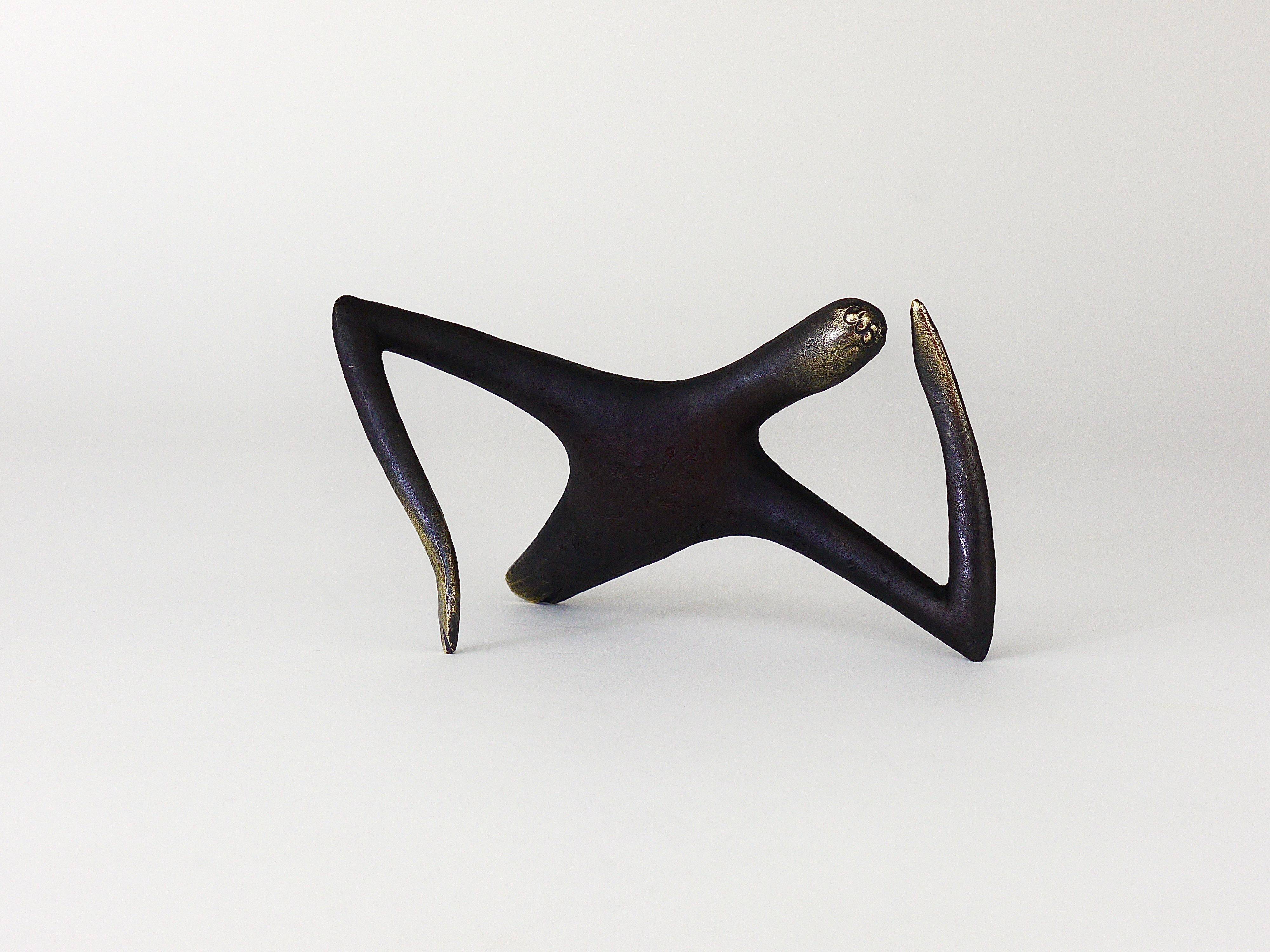 Handmade brass sculpture by Carl Auböck, Optimist Pessimist, model no. 4059.