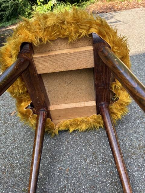 Old mustard furry armchair