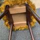 Old mustard furry armchair