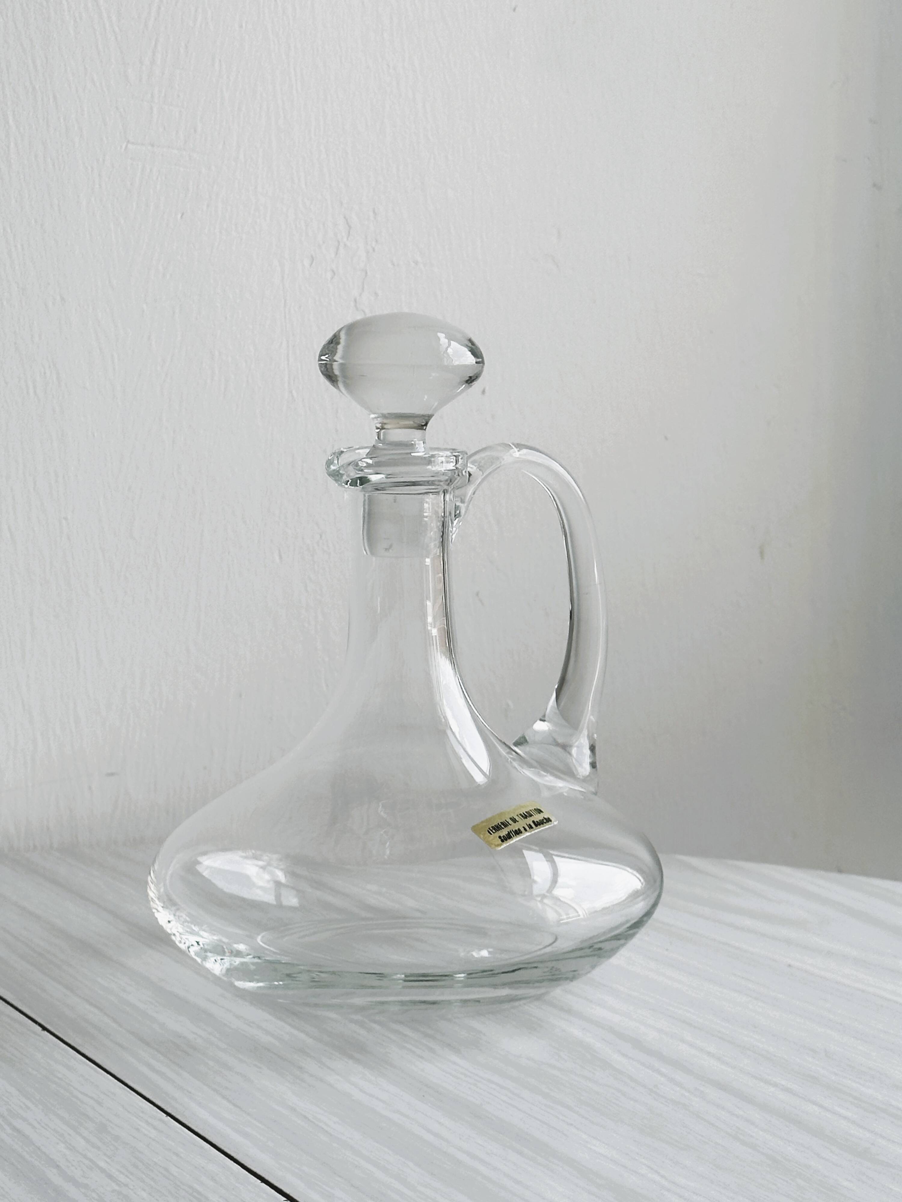 Mouth-blown glass carafe, old glassware.