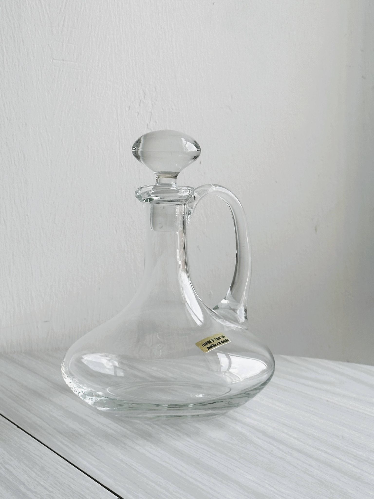 Carafe ancienne en verre soufflé à la bouche