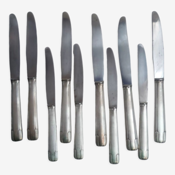 Set of 10 silver metal knives