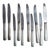 Set of 10 silver metal knives