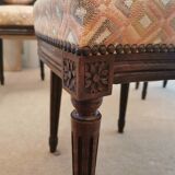 4 chaises à dossier médaillon style Louis XVI
