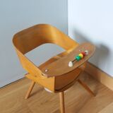 Baumann Baby Coquille children's armchair in bent wood with splayed legs.