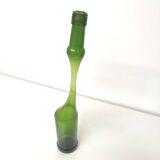 Green Negrita rum bottle atypical distorted decanter vase