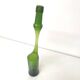 Green Negrita rum bottle atypical distorted decanter vase
