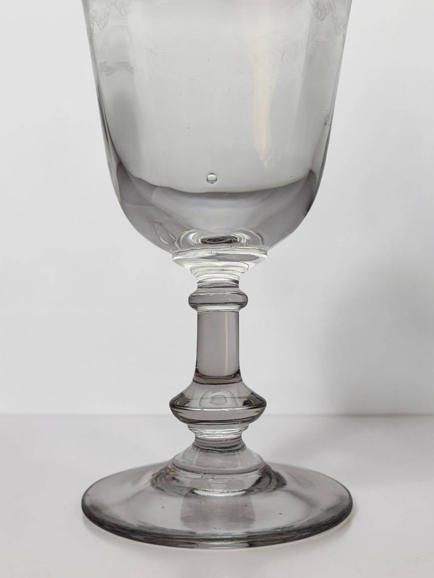 6 engraved glass wine/water glasses from the early 20th century.
