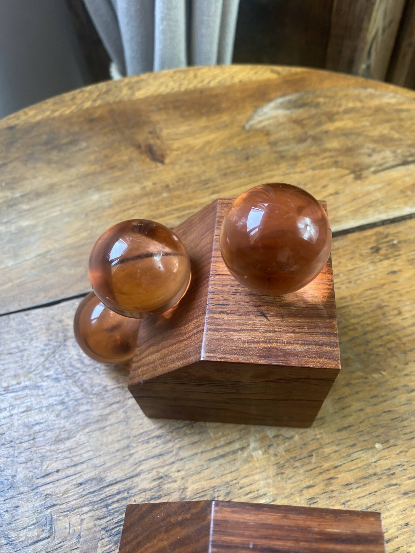 Wooden bookends and spherical glass balls