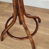 Wooden parrot coat rack on foot