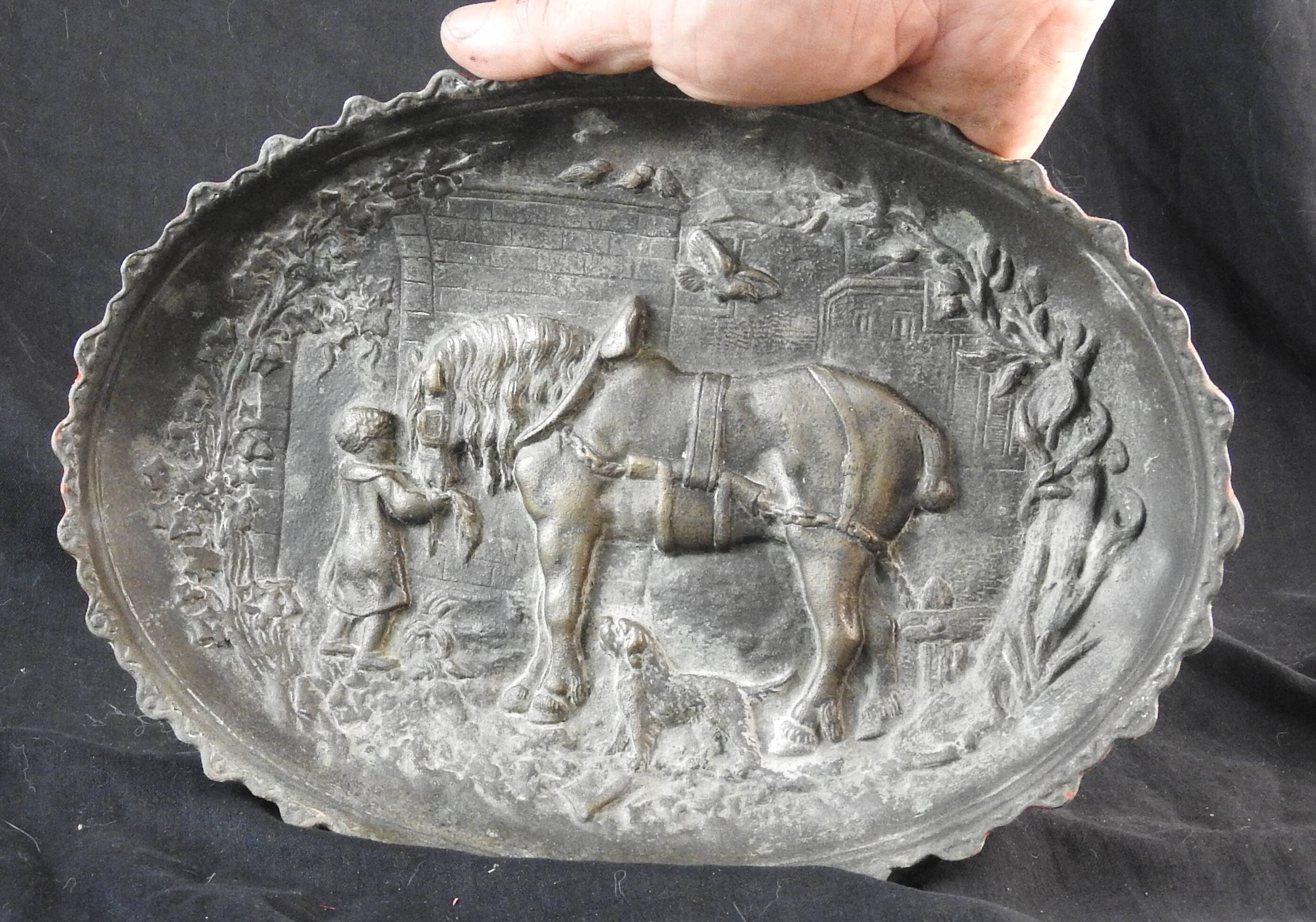 Bronze dish decorated with animals and children