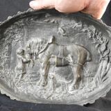 Bronze dish decorated with animals and children