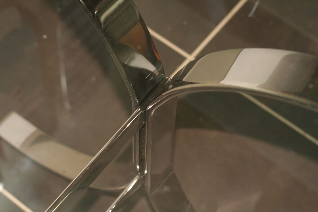 Dining table in smoked glass brown chrome structure