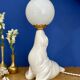 Vintage seal lamp in white ceramic and opaline.