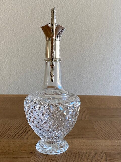 Glass and silver metal ewer