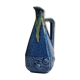 Art Deco pitcher in blue enamelled sandstone with fruit decoration, 22 cm
