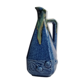 Art Deco pitcher in blue enamelled sandstone with fruit decoration, 22 cm