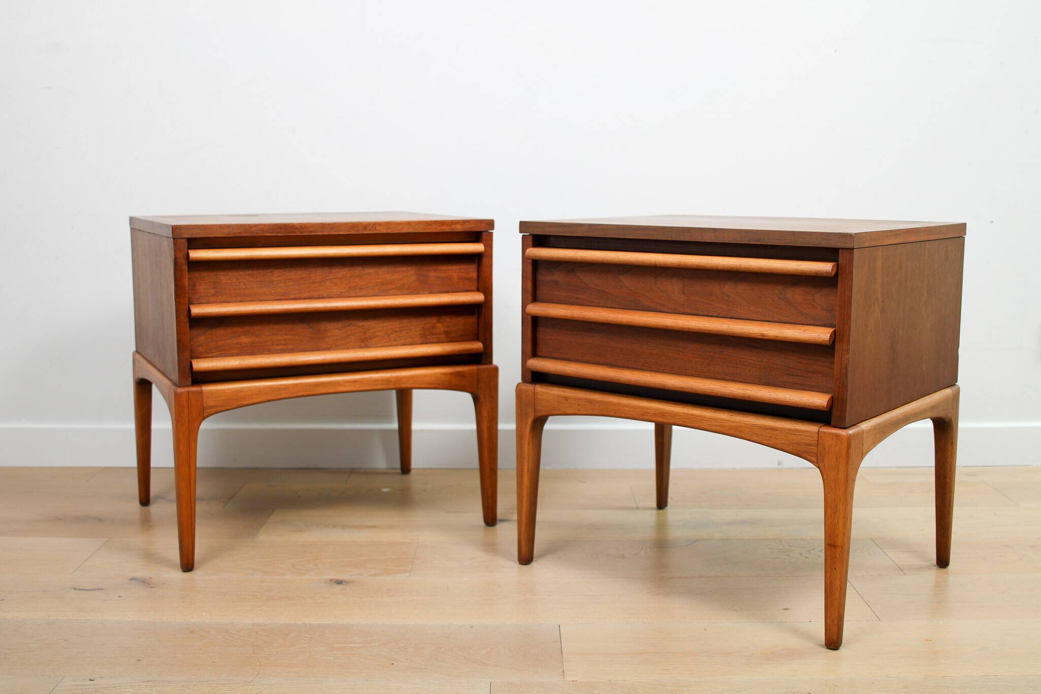 A pair of Vintage Mid-century style Lane 'Rhythm' bedside tables in walnut