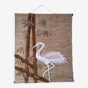 Jute hanging with bird and vintage foliage decor
