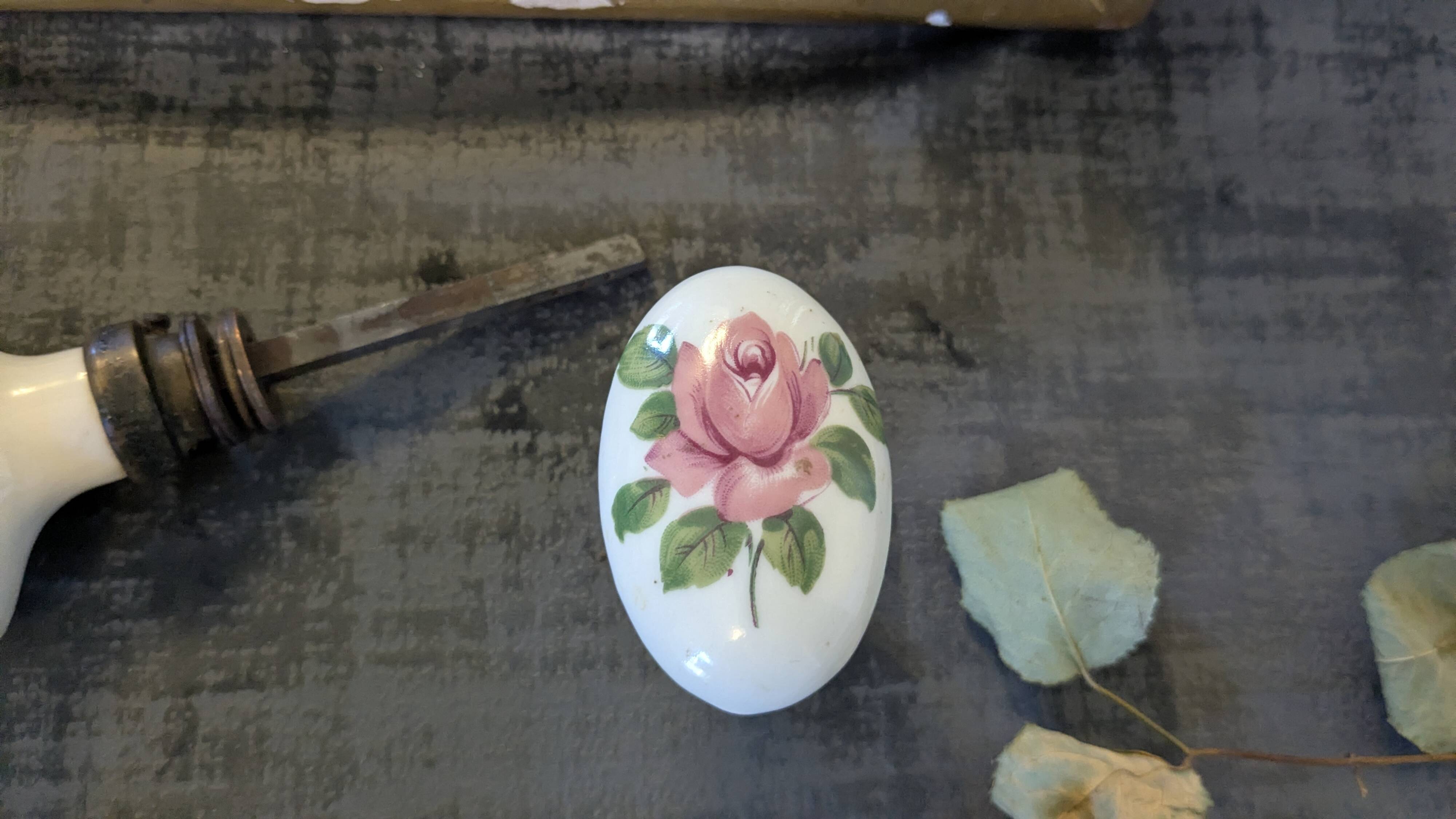 Pair of floral ceramic handles, vintage charm