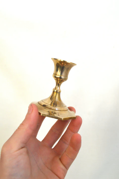 Duo of brass candle holders