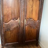 Beautiful and ancient Norman wedding wardrobe, richly carved