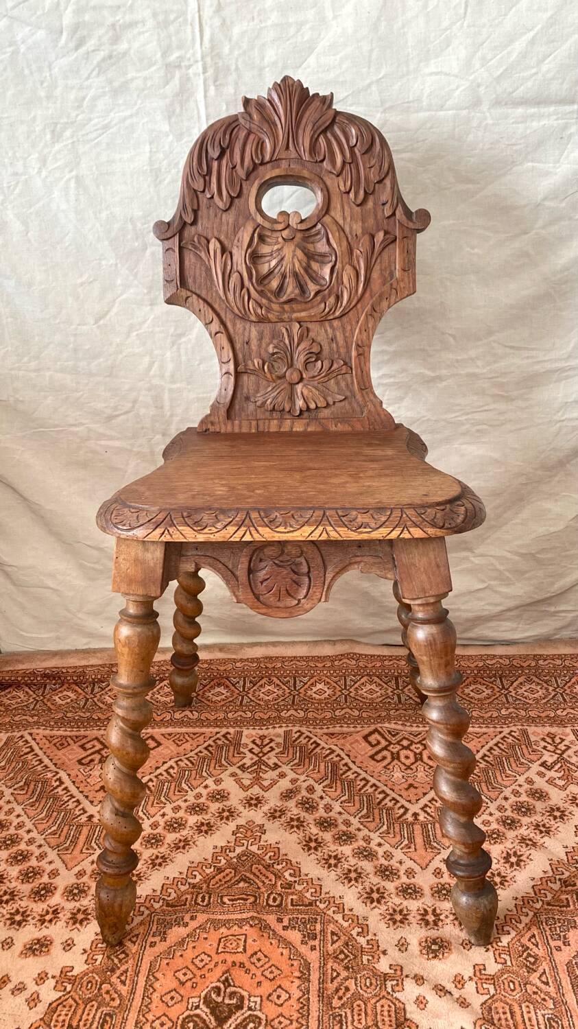Antique Alsatian chair in carved wood
