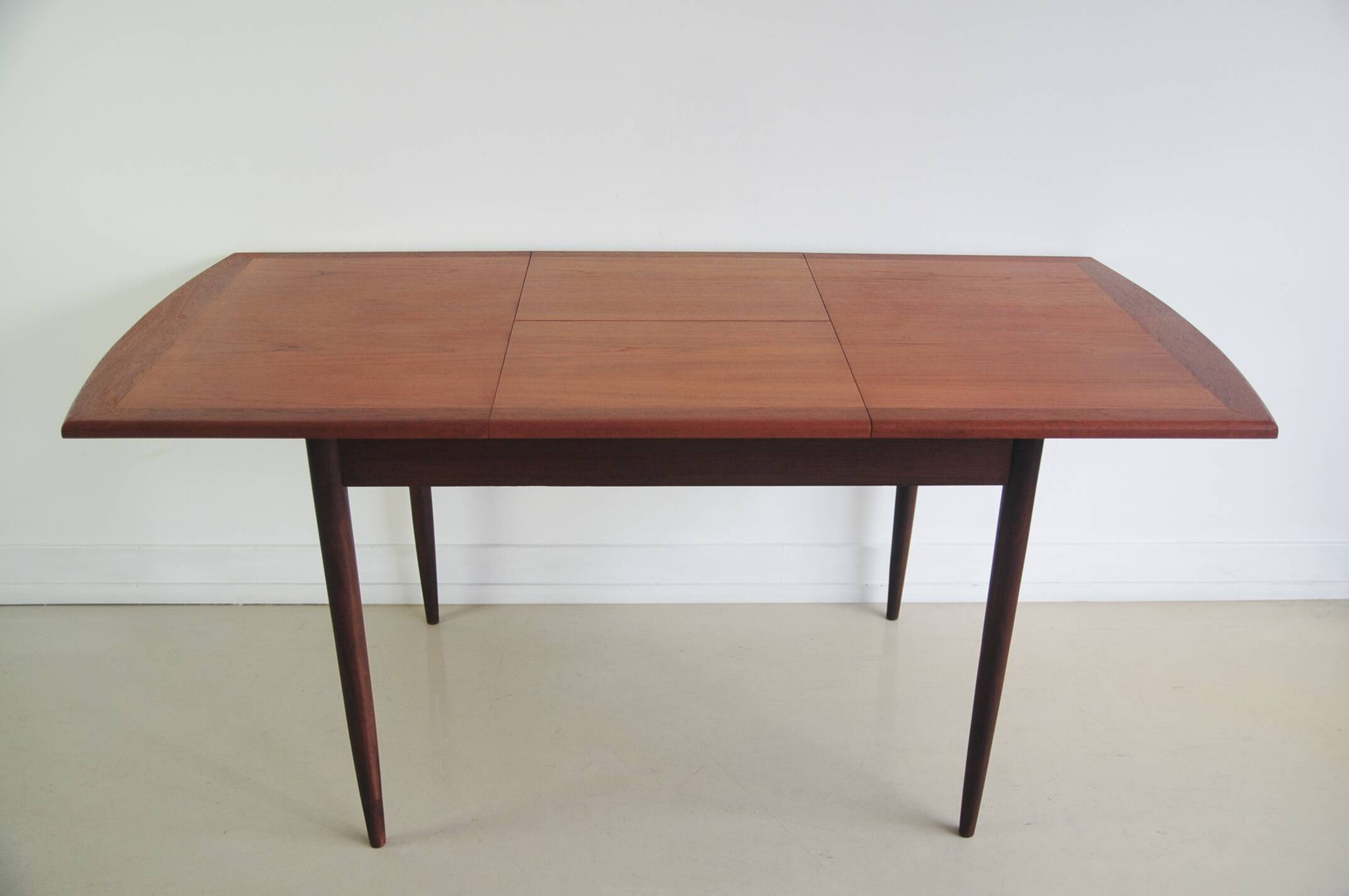 Folding teak dining table