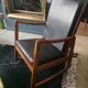 Rocking-chair in teak and skai