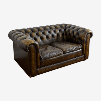 Vintage two-seater leather Chesterfield sofa
