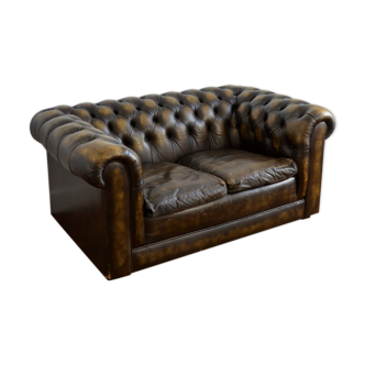 Vintage two-seater leather Chesterfield sofa