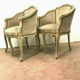 Paire de fauteuils de style Louis XV en hêtre patiné XX siècle