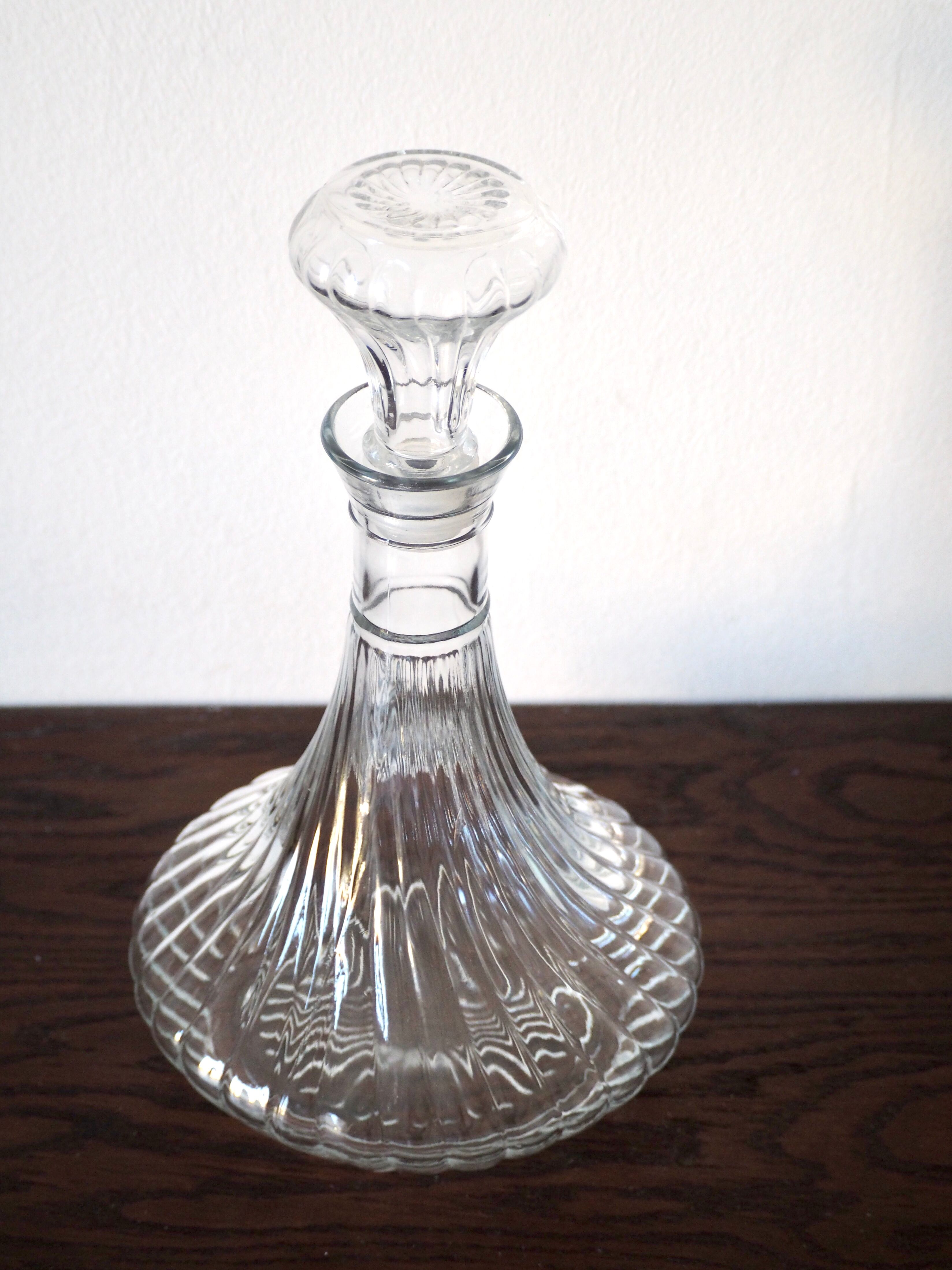 Scrolled glass wine decanter