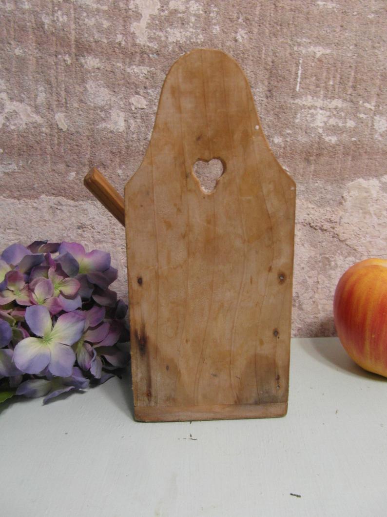 Vintage wooden salt box with spoon