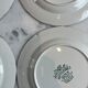 Set of four flat plates from English earthenware.