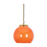 Orange glass pendant light by Peill Putzler, Germany, 1970.