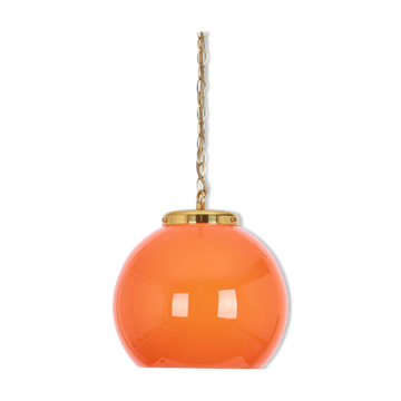 Orange glass pendant light by Peill Putzler, Germany, 1970.