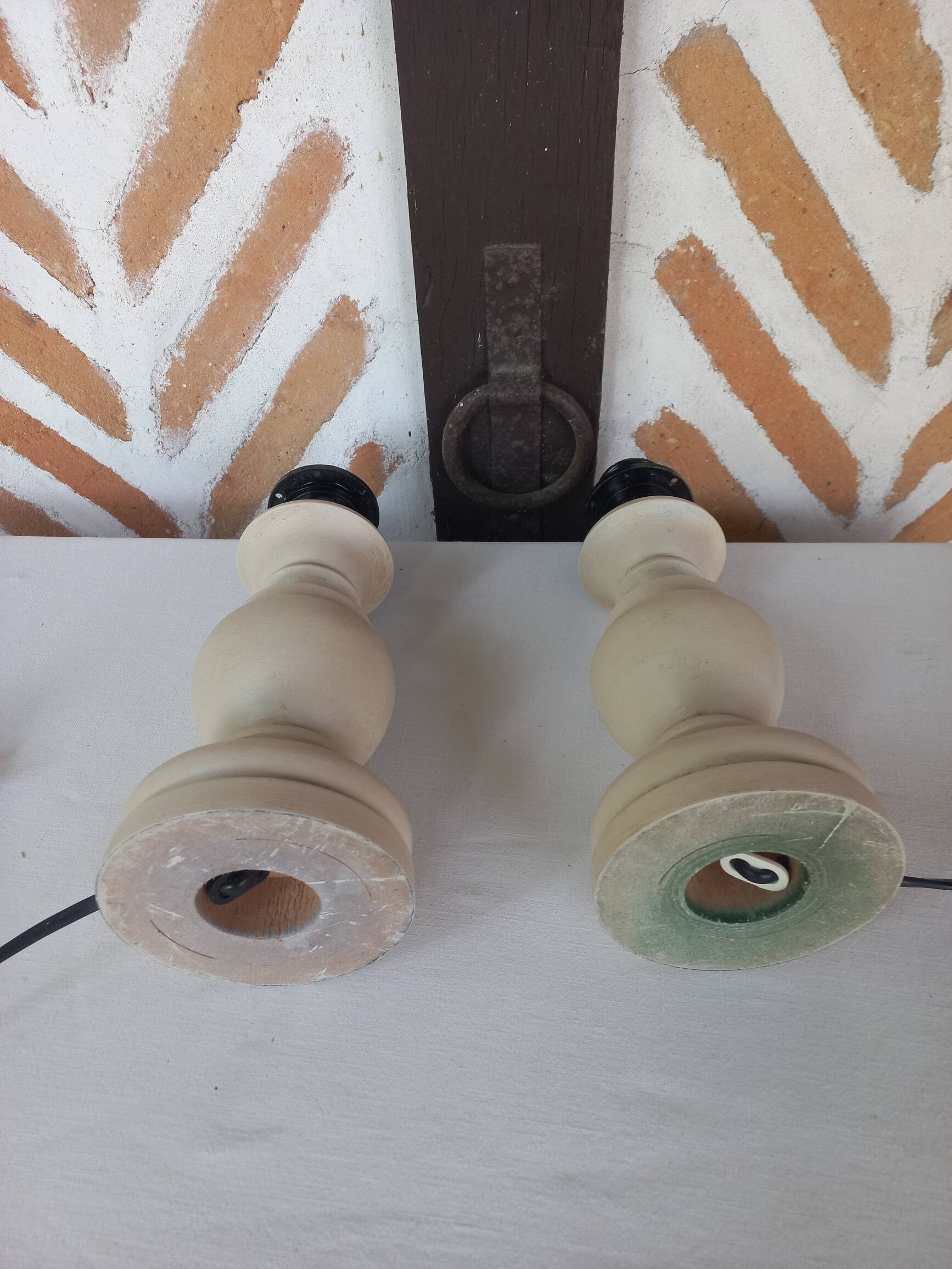 Pair of off-white patinated lamp bases