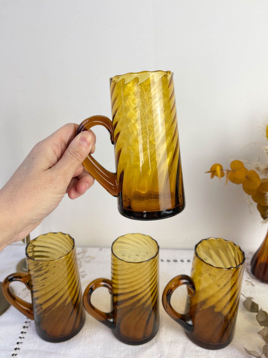 Set of 5 vintage beer glasses in amber twisted glass