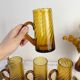 Set of 5 vintage beer glasses in amber twisted glass