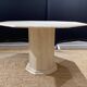 Octagonal table in light travertine