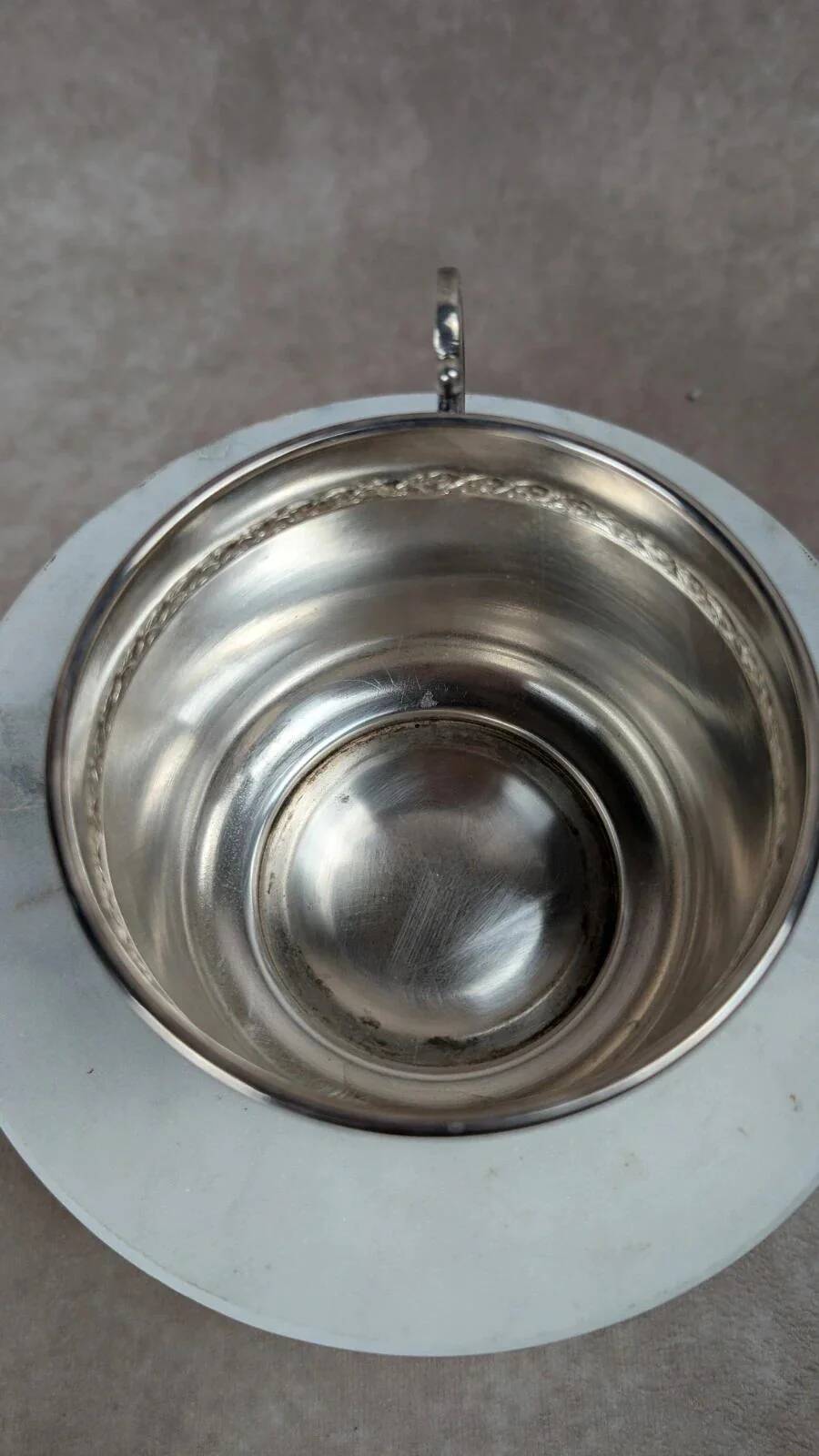 Vintage silver-plated cup and saucer