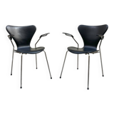 Pair of Arne Jacobsen series 7 chairs in black leather