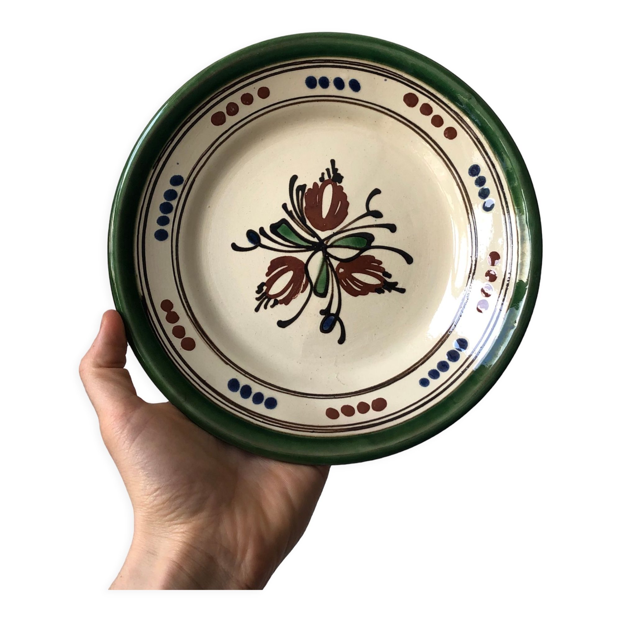 Very decorative serving plate in terracotta, floral and geometric motifs.