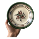 Very decorative serving plate in terracotta, floral and geometric motifs.