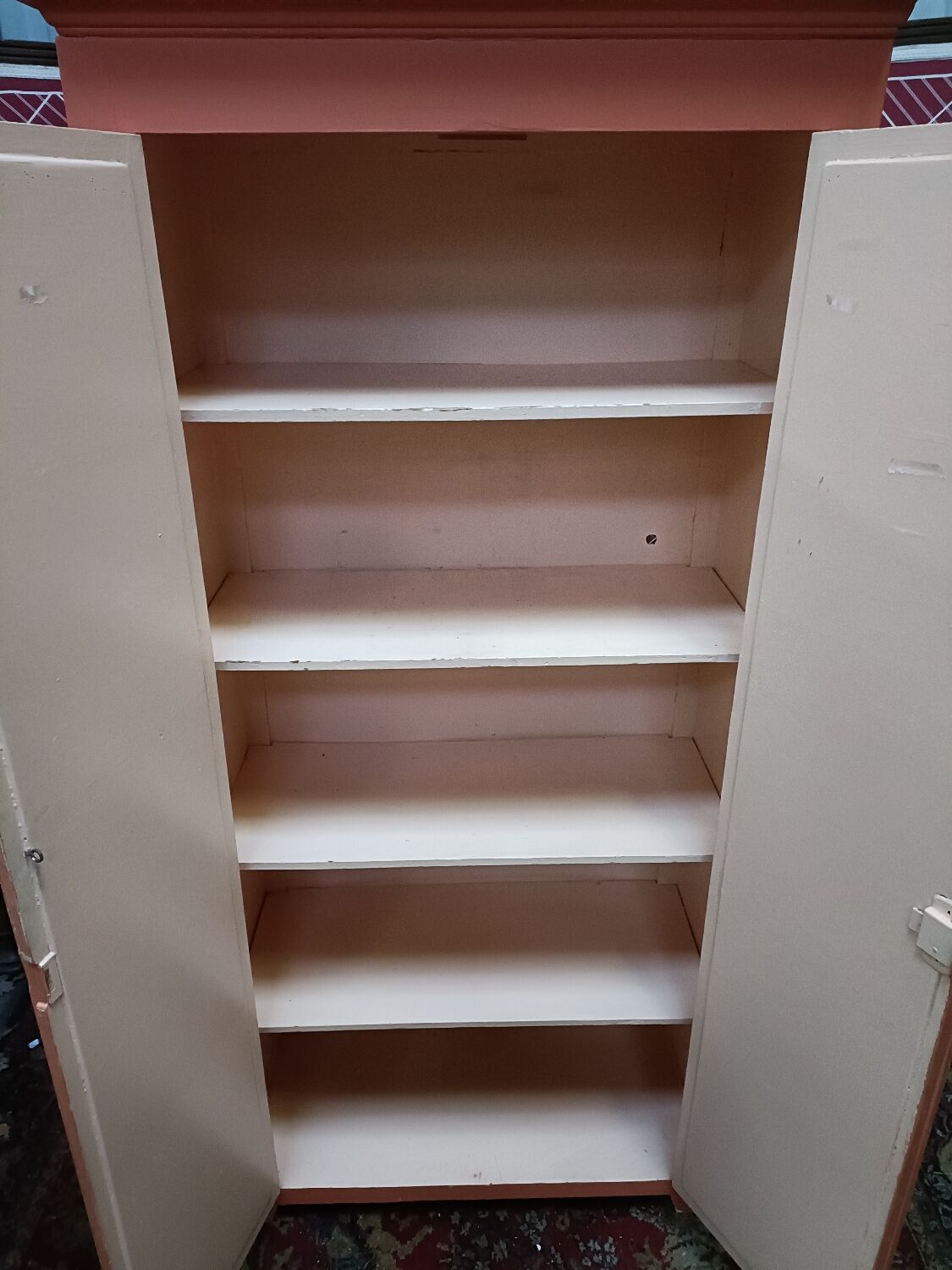 Vintage two-door cabinet with shelves