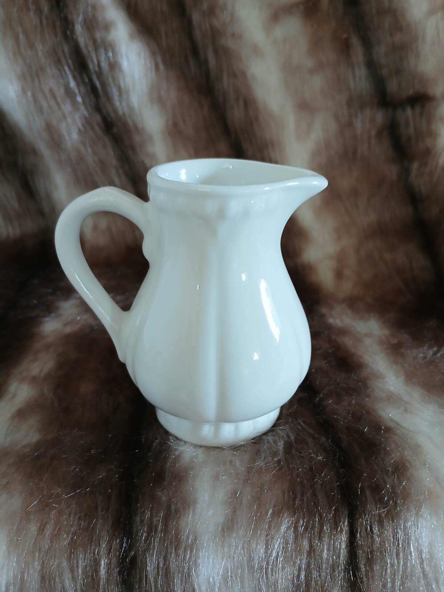 2 antique pitchers in white earthenware