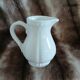 2 antique pitchers in white earthenware
