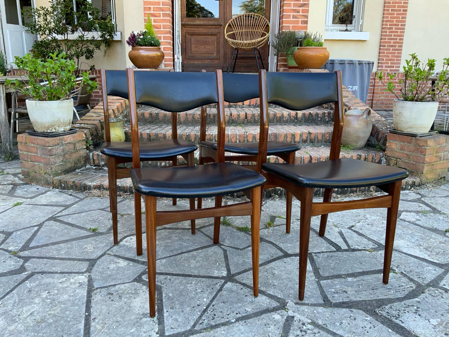 4 Scandinavian black leatherette chairs